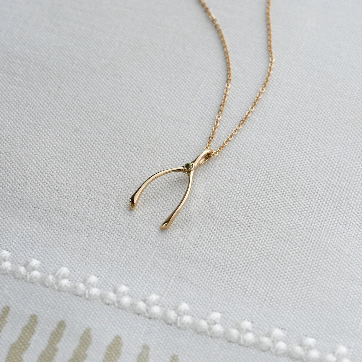 Small Peridot Wishbone Pendant in Solid 14k Gold (August) - Image 3
