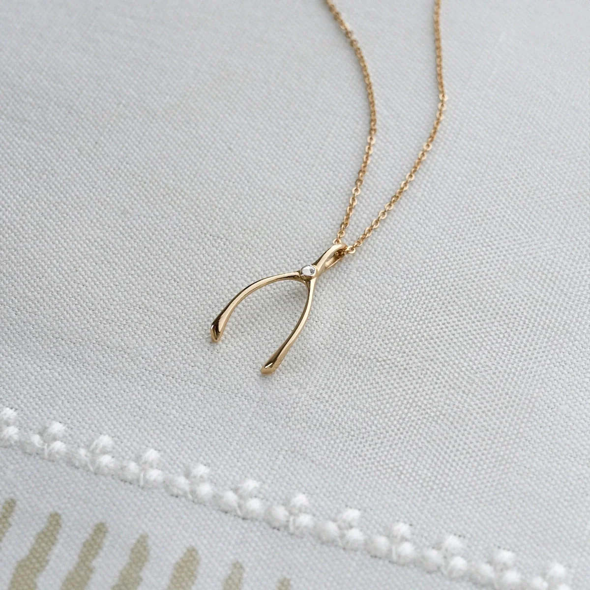 Small White Topaz Wishbone Pendant in Solid 14k Gold (April) - Image 3
